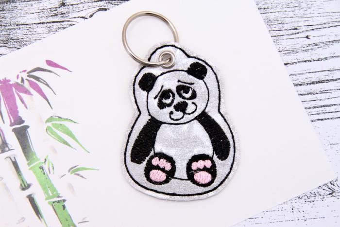 Sale Schlüsselanhänger Panda in silber/ schwarz Glitzer